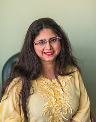 Mrs. Jacquelin Tharwat